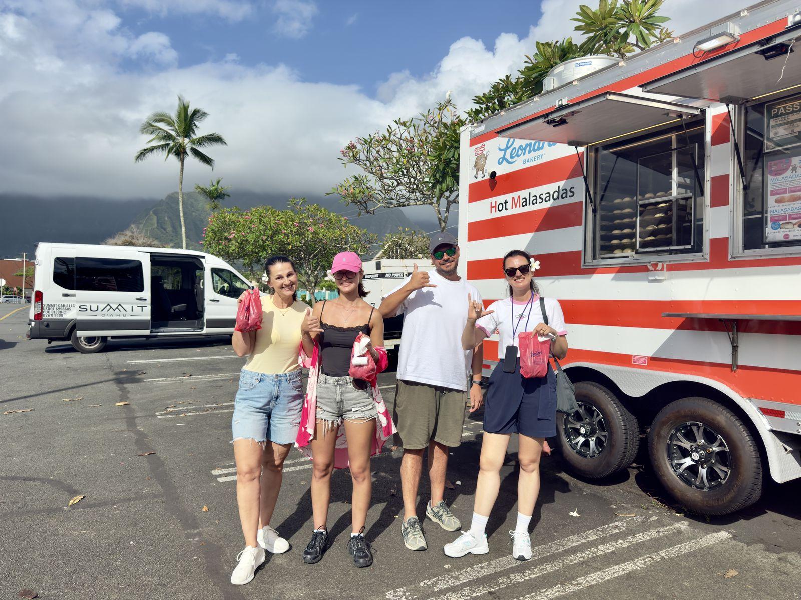 Guests with the Summit van at the Leonard’s Malasadamobile